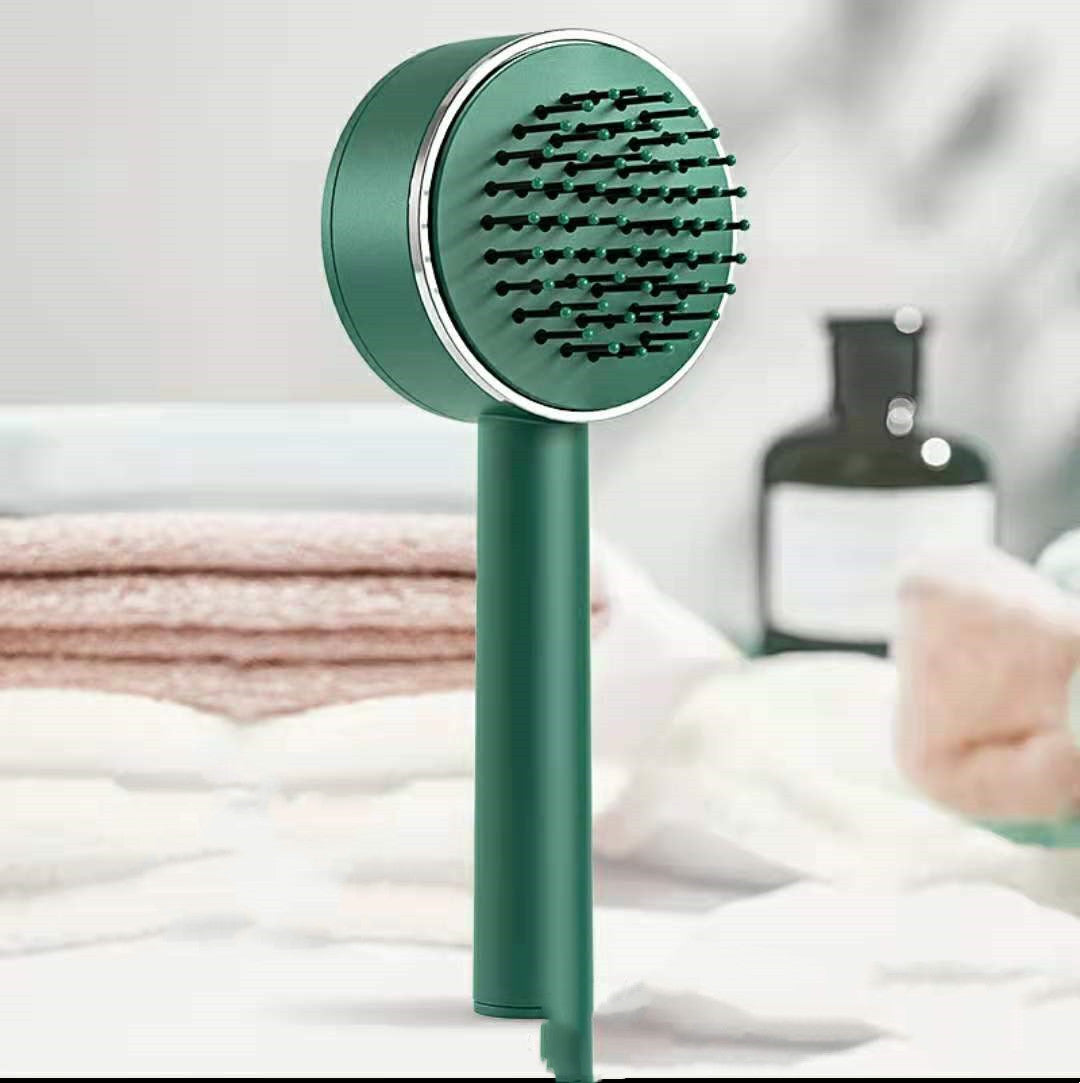 brosse de massage avec éjecteur de fil libre