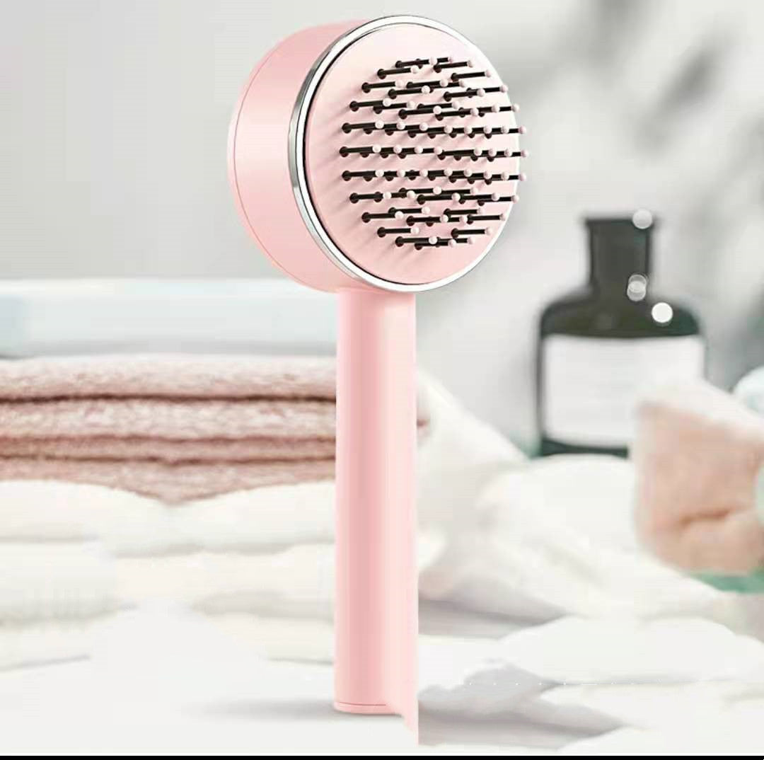 brosse de massage avec éjecteur de fil libre